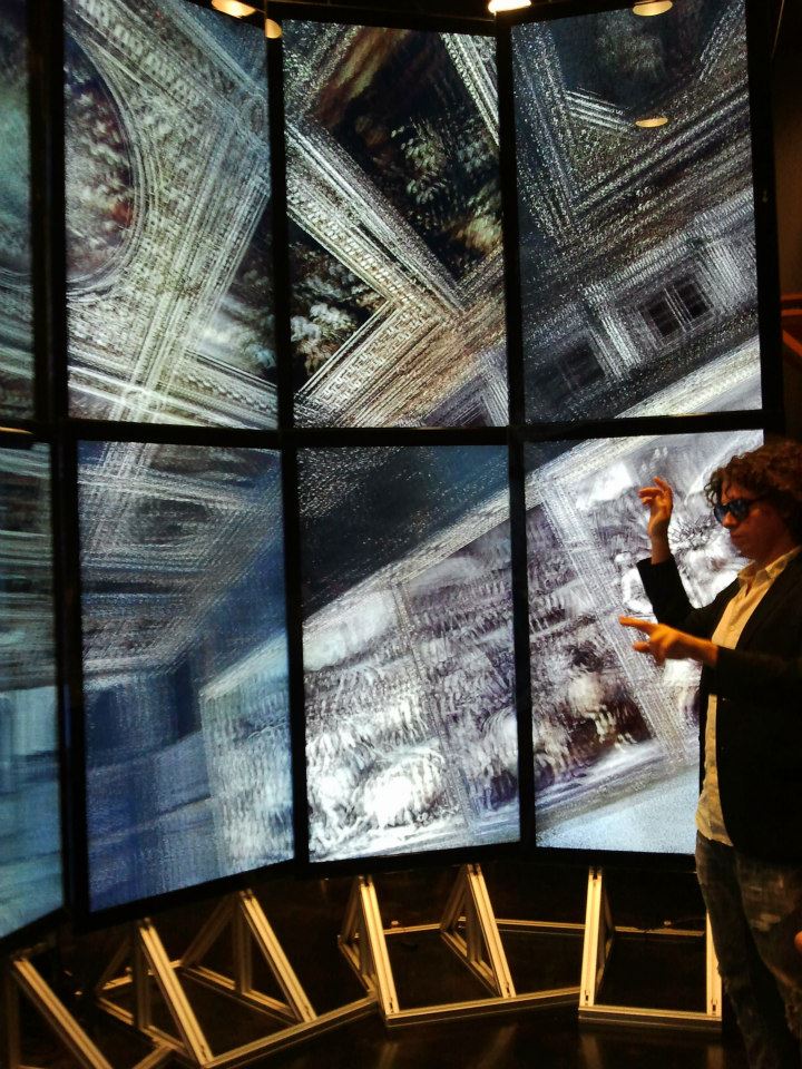 Vid Petrovic demonstrating his point cloud software in an interactive cave environment built in UCSD's new SME visualization lab for the building's grant opening. 