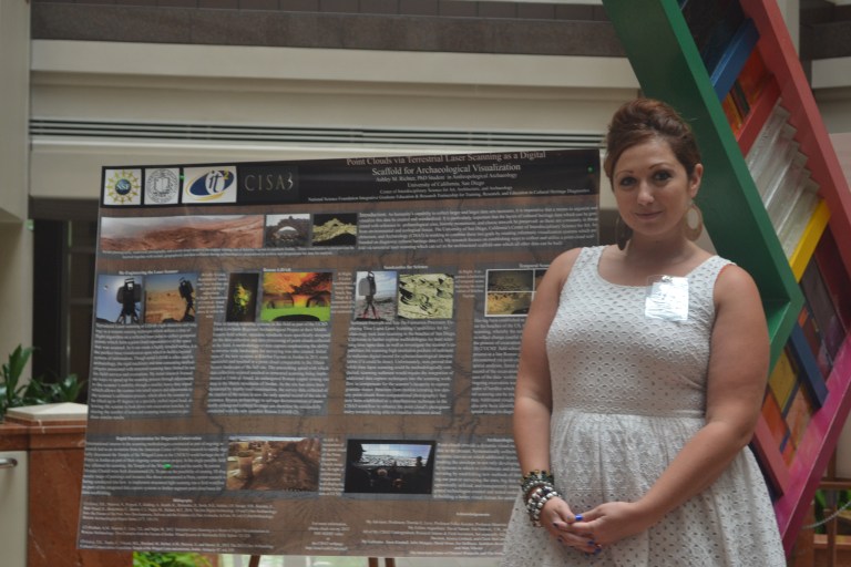 Ashley M. Richter in front of her poster at the National Science Foundation IGERT Poster and Video Competition.